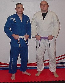 Two Brazilian jiu-jitsu practitioners wearing Gis